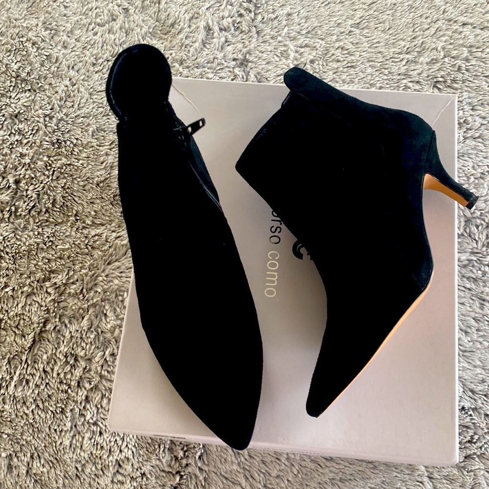 The black boot worn only once or twice. The gray boots have never been worn.